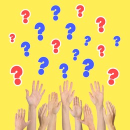 Image of People raising hands and question marks on yellow background, closeup