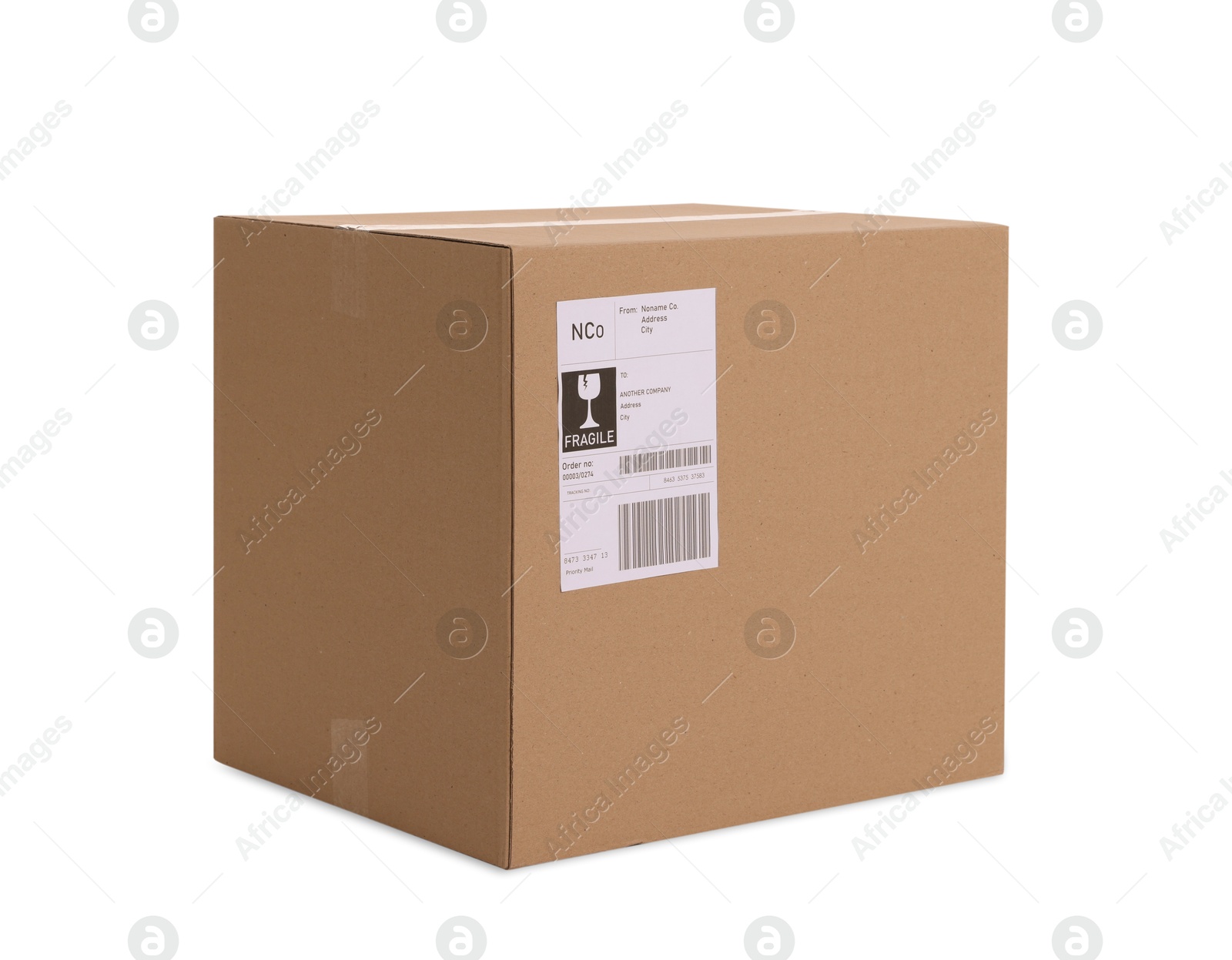 Photo of One parcel with shipment label isolated on white