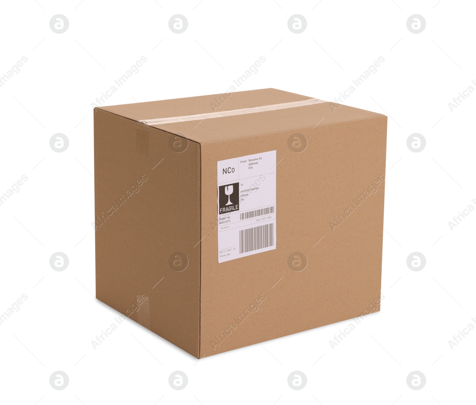 Photo of One parcel with shipment label isolated on white