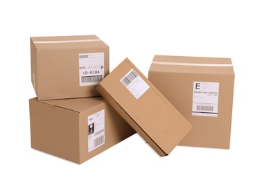 Photo of Many parcels with shipment labels isolated on white