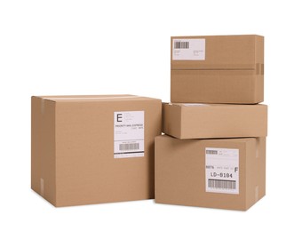 Photo of Many parcels with shipment labels isolated on white