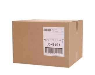 Photo of One parcel with shipment label isolated on white