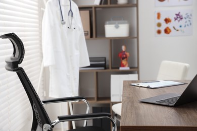 Photo of Doctor's workplace in medical office. Healthcare service