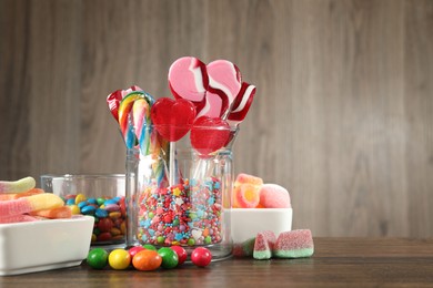 Photo of Candy bar. Many different tasty sweets on wooden table