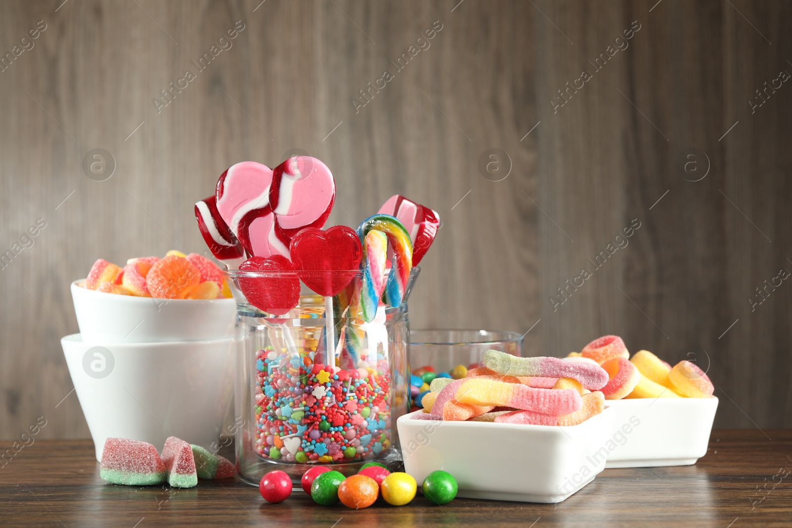 Photo of Candy bar. Many different tasty sweets on wooden table