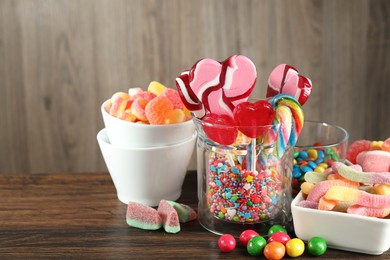 Photo of Candy bar. Many different tasty sweets on wooden table