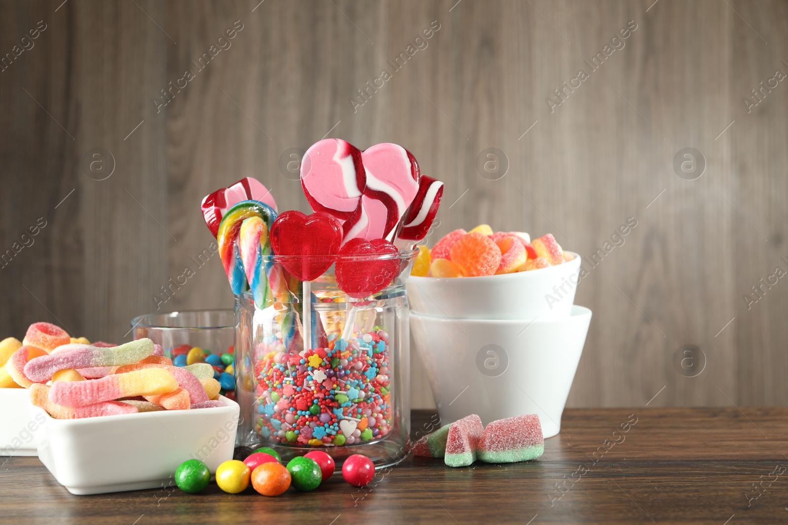 Photo of Candy bar. Many different tasty sweets on wooden table