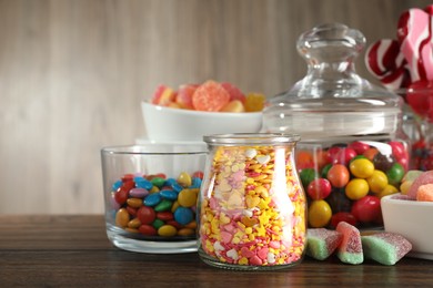 Photo of Candy bar. Many different tasty sweets on wooden table