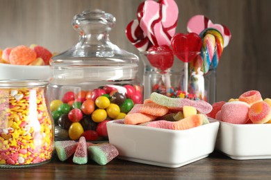 Photo of Candy bar. Many different tasty sweets on wooden table