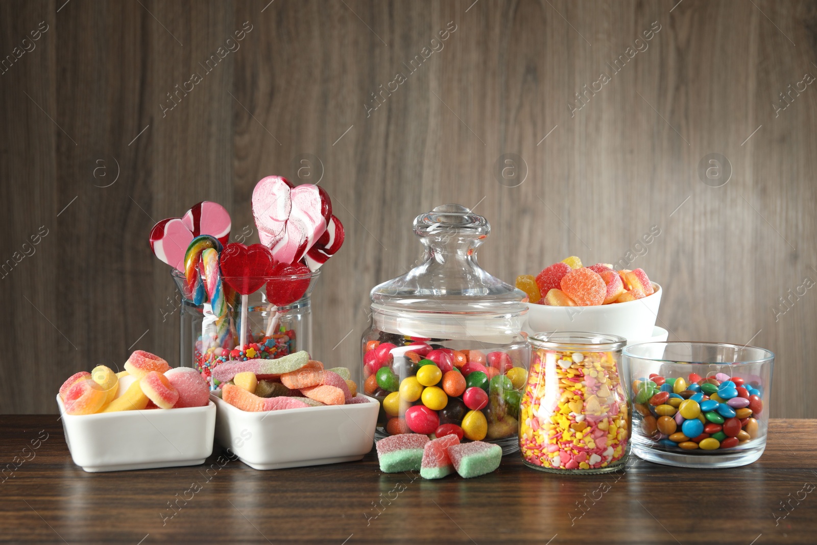 Photo of Candy bar. Many different tasty sweets on wooden table