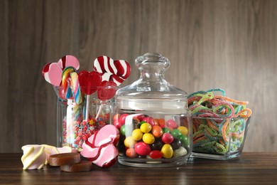 Photo of Candy bar. Many different tasty sweets on wooden table