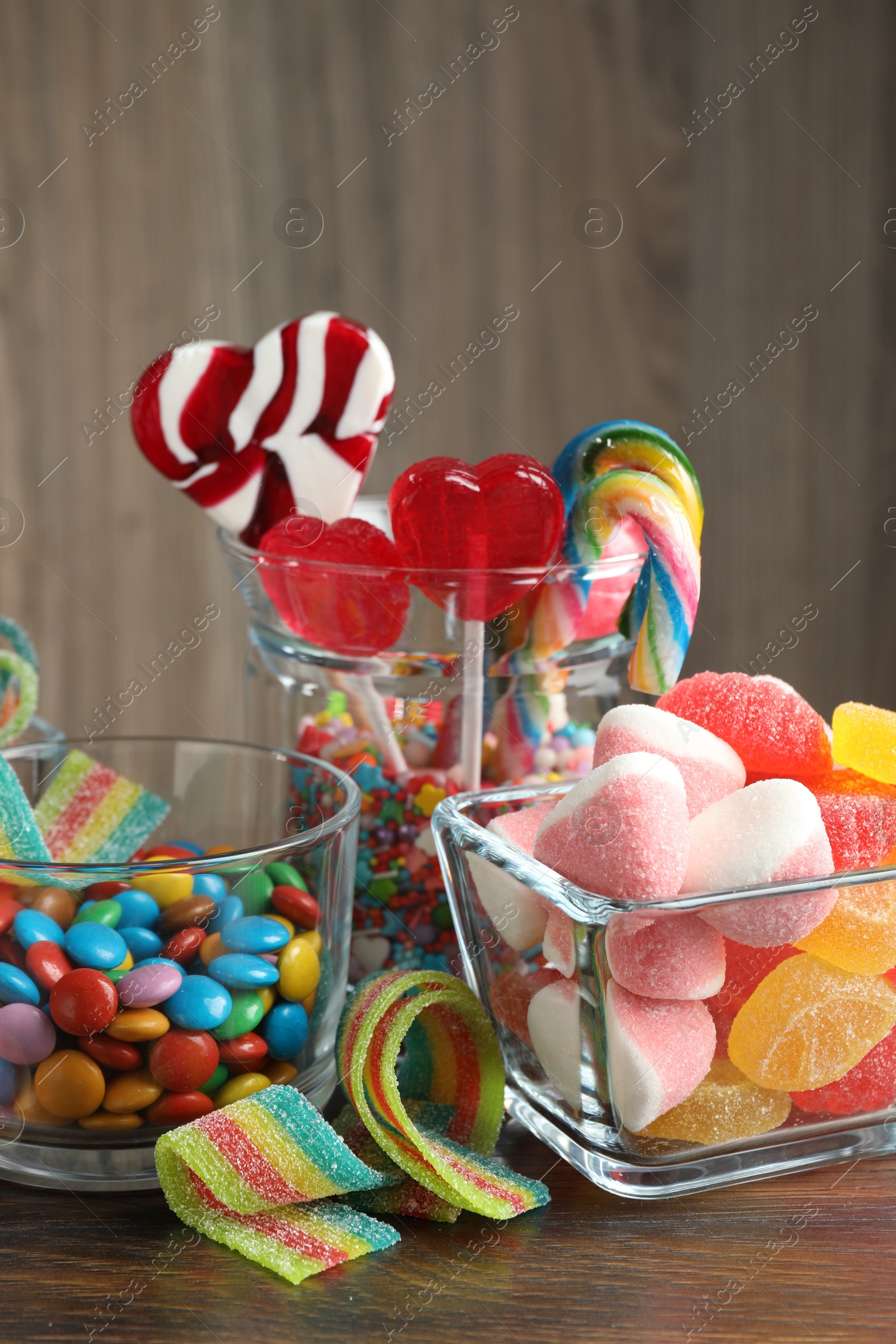 Photo of Candy bar. Many different tasty sweets on wooden table