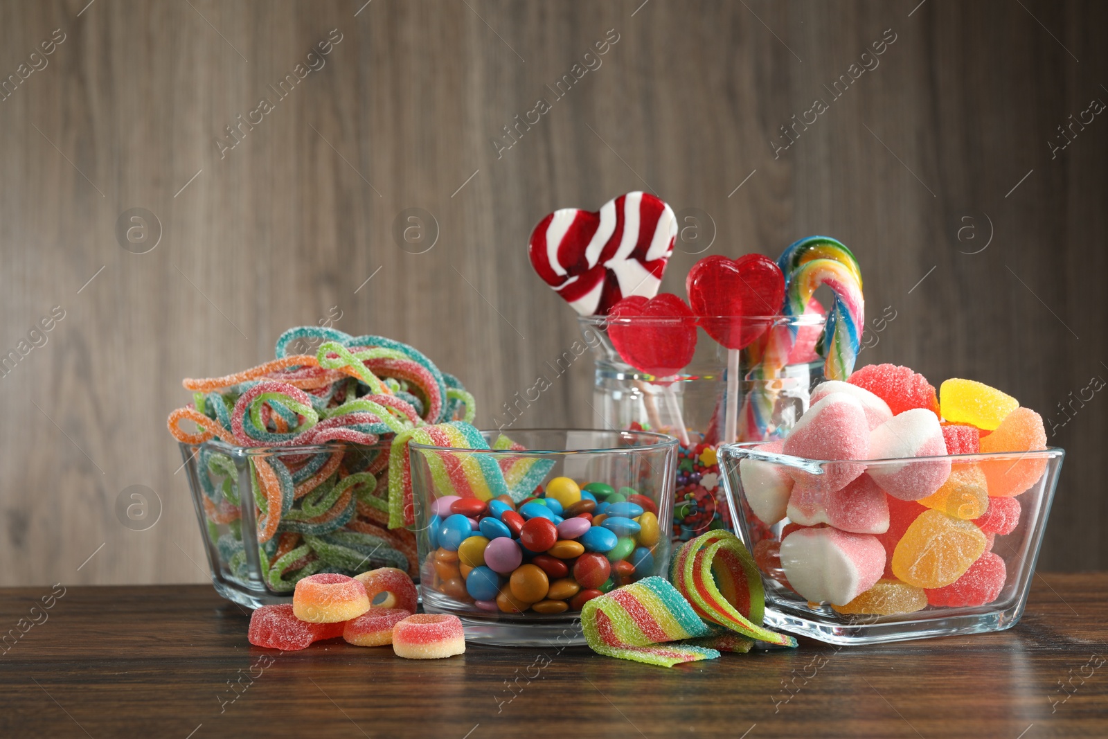 Photo of Candy bar. Many different tasty sweets on wooden table