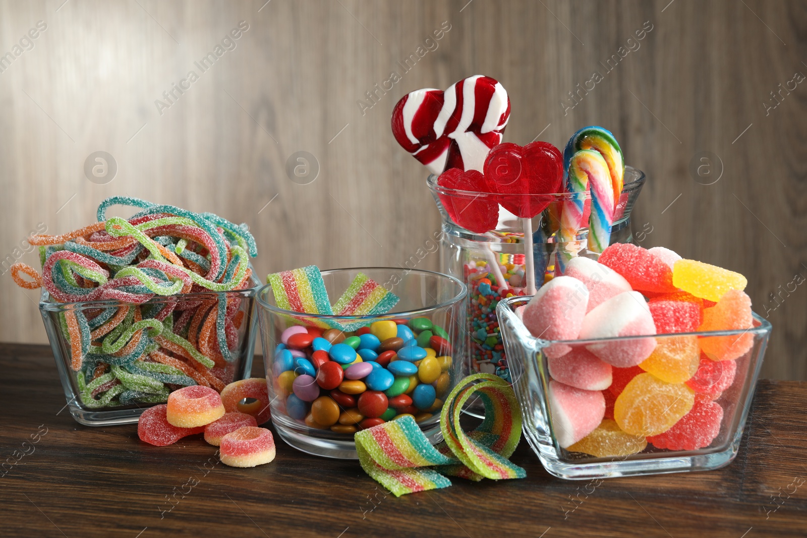 Photo of Candy bar. Many different tasty sweets on wooden table