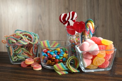 Photo of Candy bar. Many different tasty sweets on wooden table