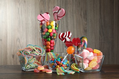 Photo of Candy bar. Many different tasty sweets on wooden table