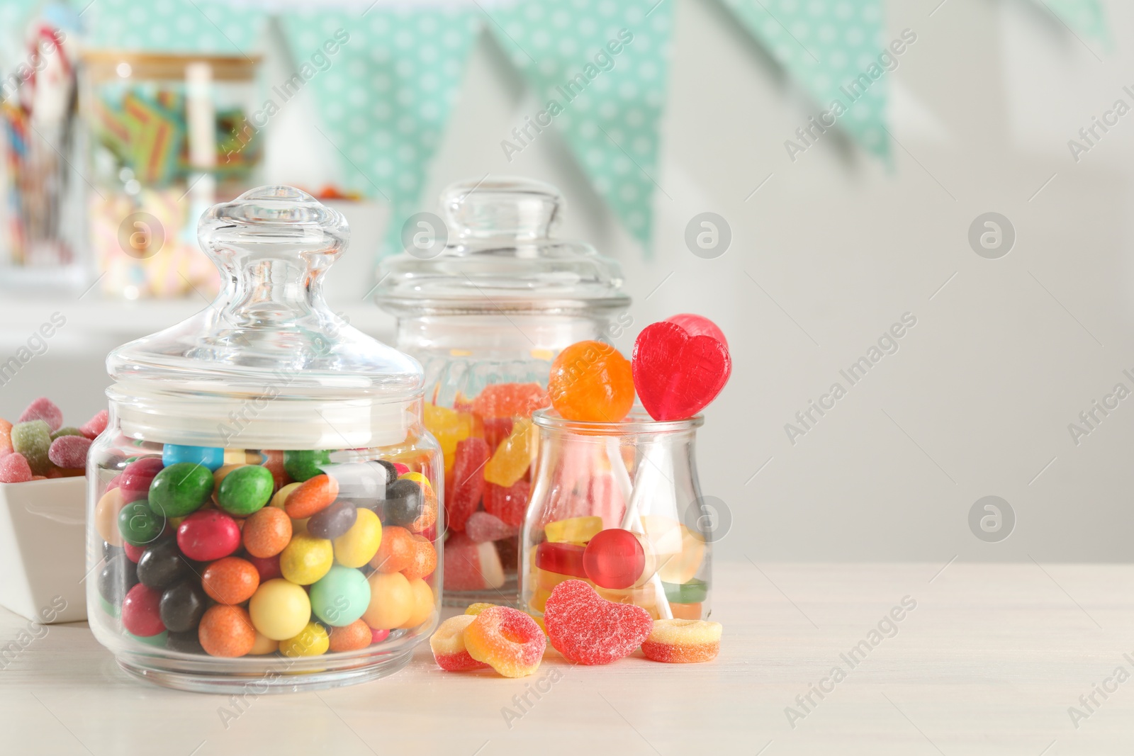 Photo of Candy bar. Many different sweets on white table indoors, closeup. Space for text