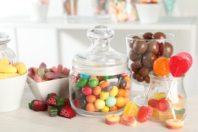 Photo of Candy bar. Many different sweets on white table indoors, closeup