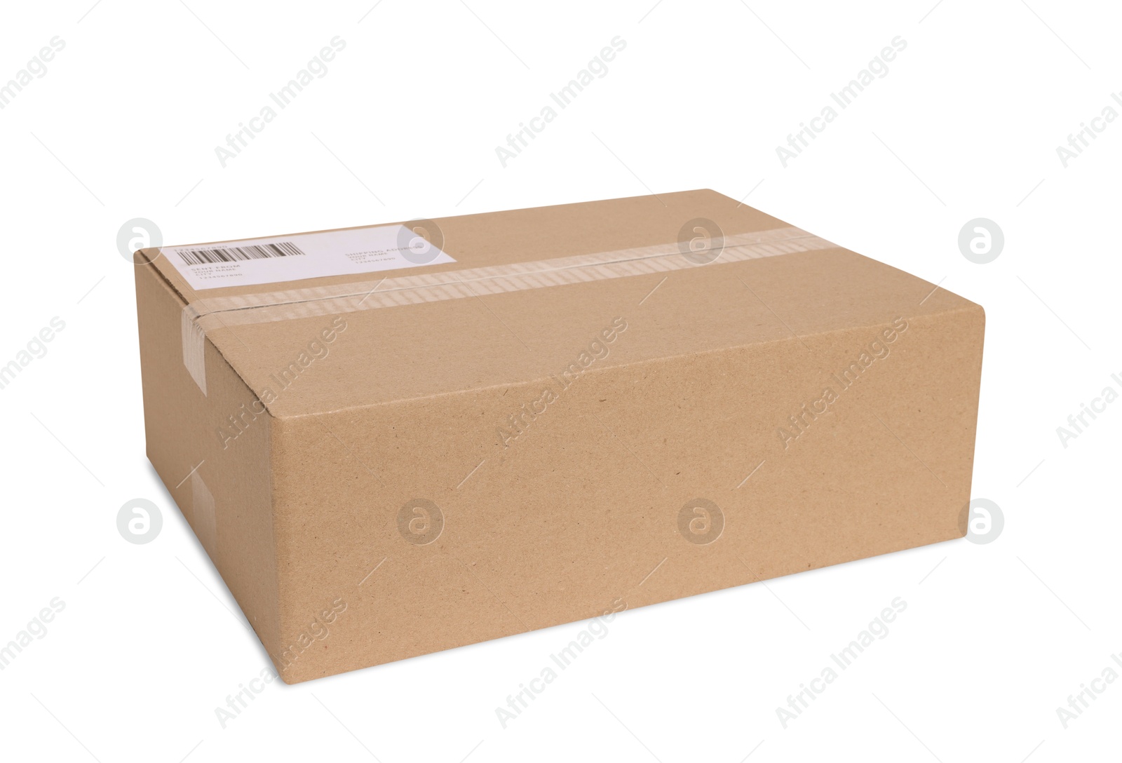 Photo of One parcel with shipment label isolated on white