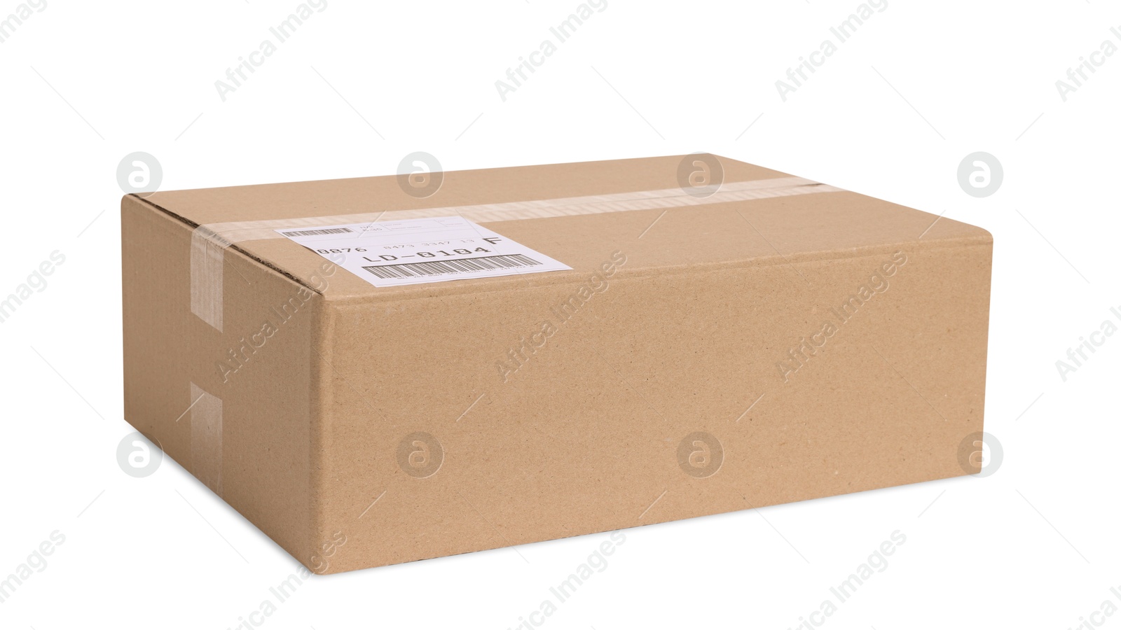 Photo of One parcel with shipment label isolated on white