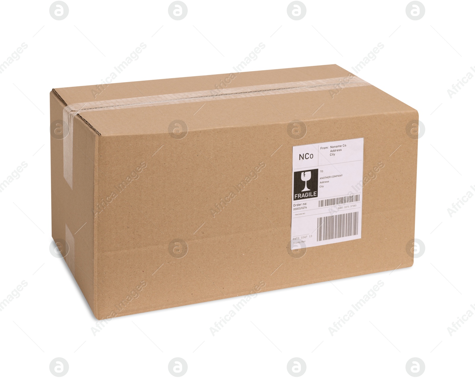 Photo of One parcel with shipment label isolated on white