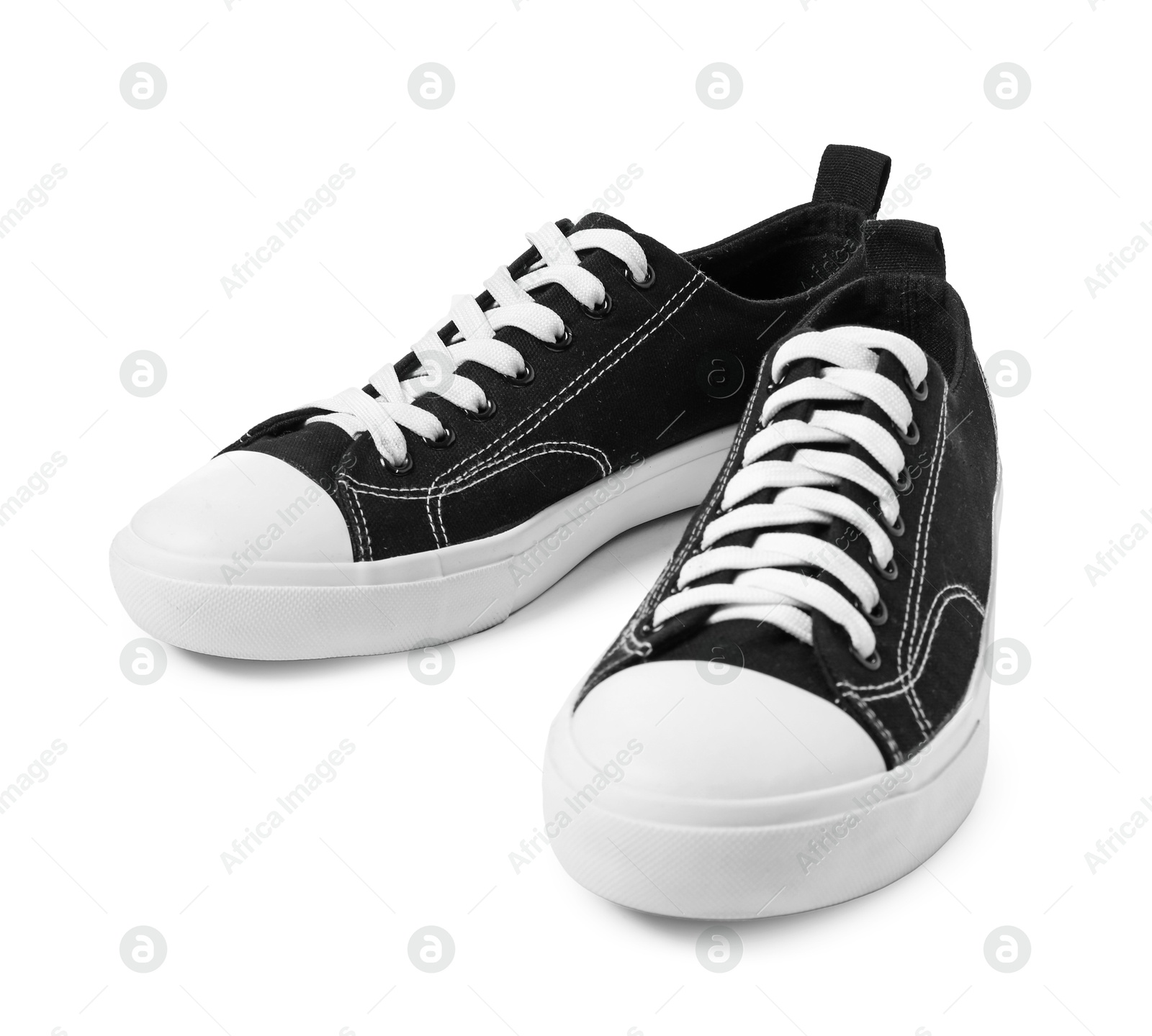 Photo of Pair of black sneakers isolated on white. Sportive shoes