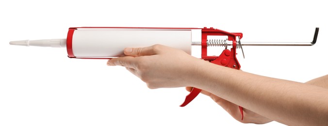 Photo of Woman with glue gun on white background, closeup