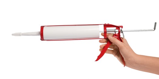 Photo of Woman with glue gun on white background, closeup