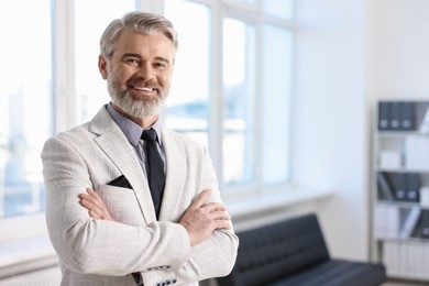 Photo of Banker with crossed arms in office, space for text