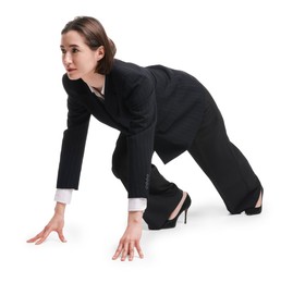 Photo of Businesswoman in starting position for run ready for competition on white background