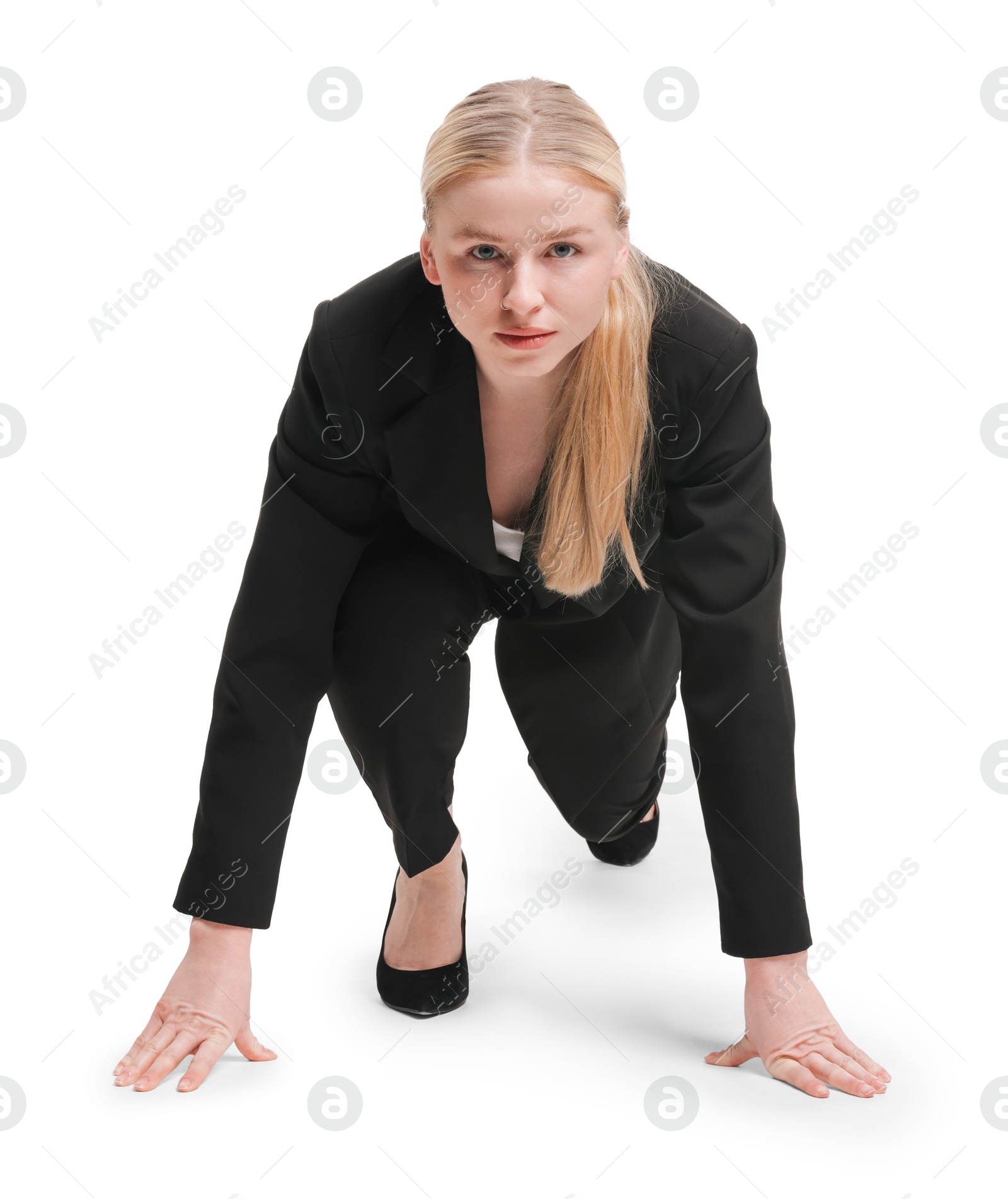 Photo of Businesswoman in starting position for run ready for competition on white background