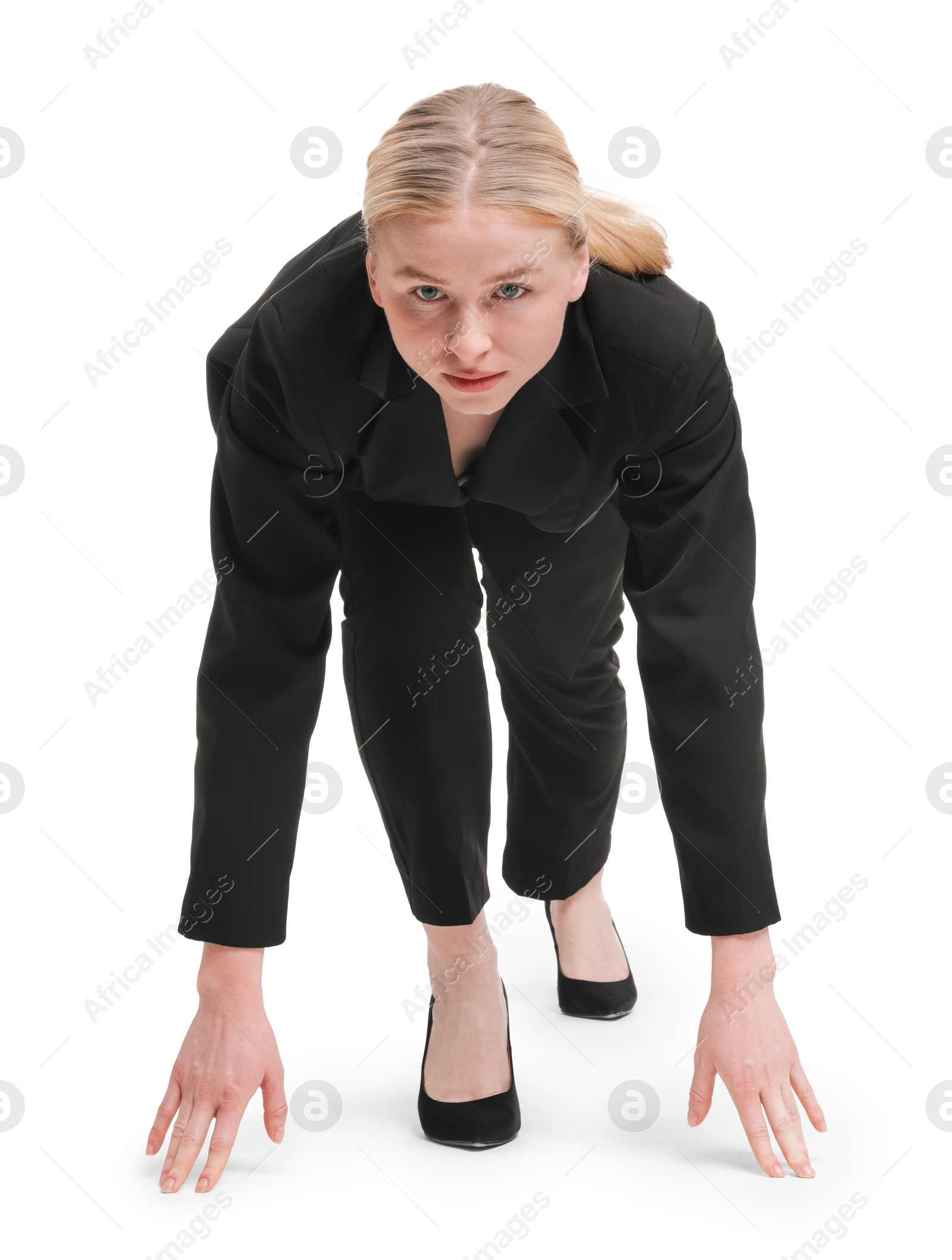 Photo of Businesswoman in starting position for run ready for competition on white background