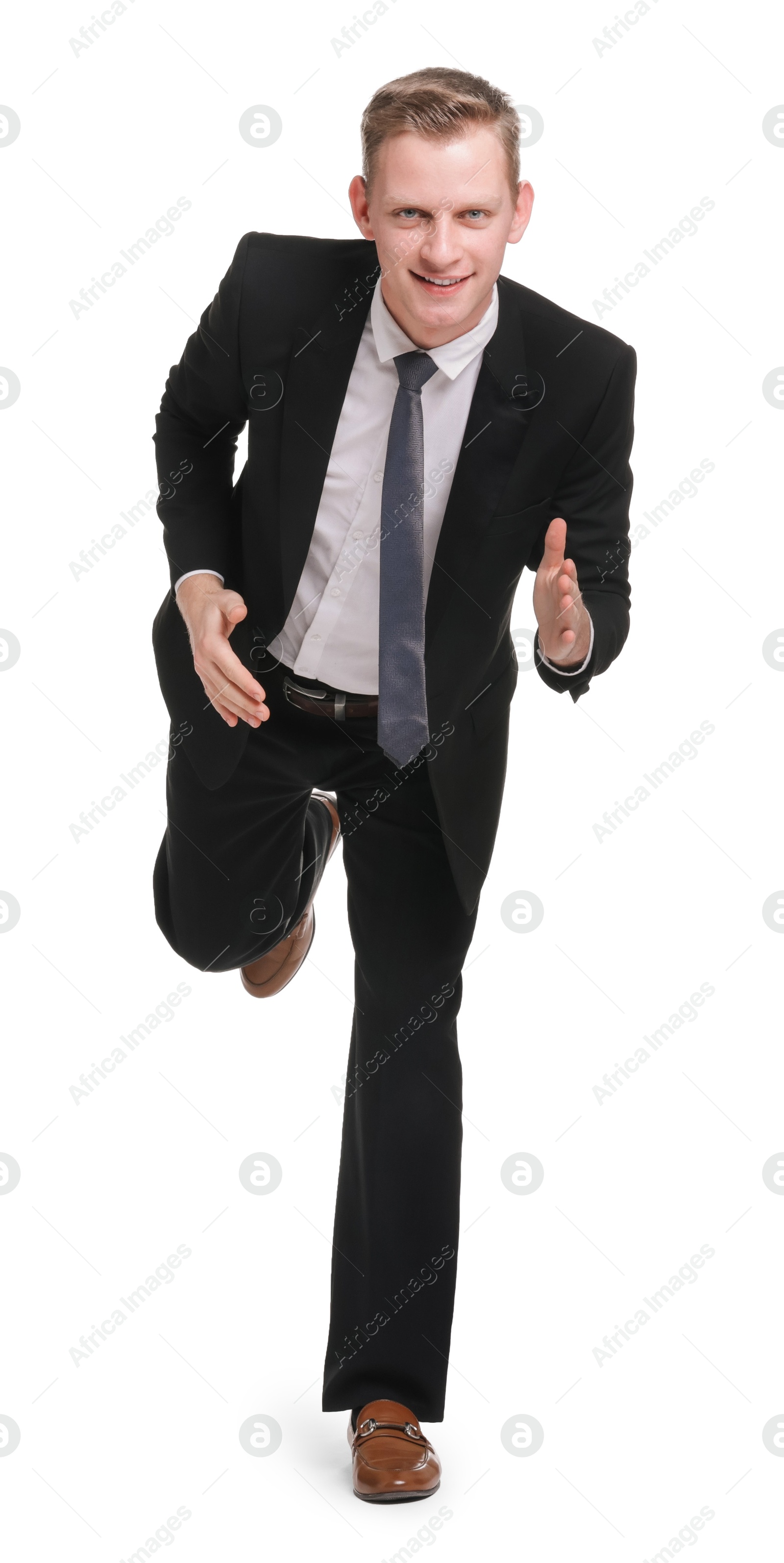 Photo of Business competition. Happy man running on white background