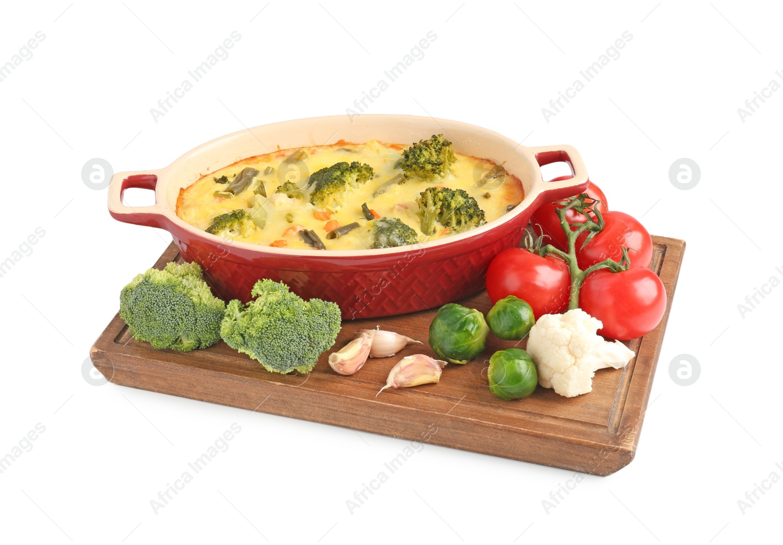 Photo of Delicious vegetable casserole and ingredients isolated on white