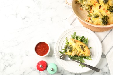 Photo of Tasty vegetable casserole served on white marble table, flat lay. Space for text