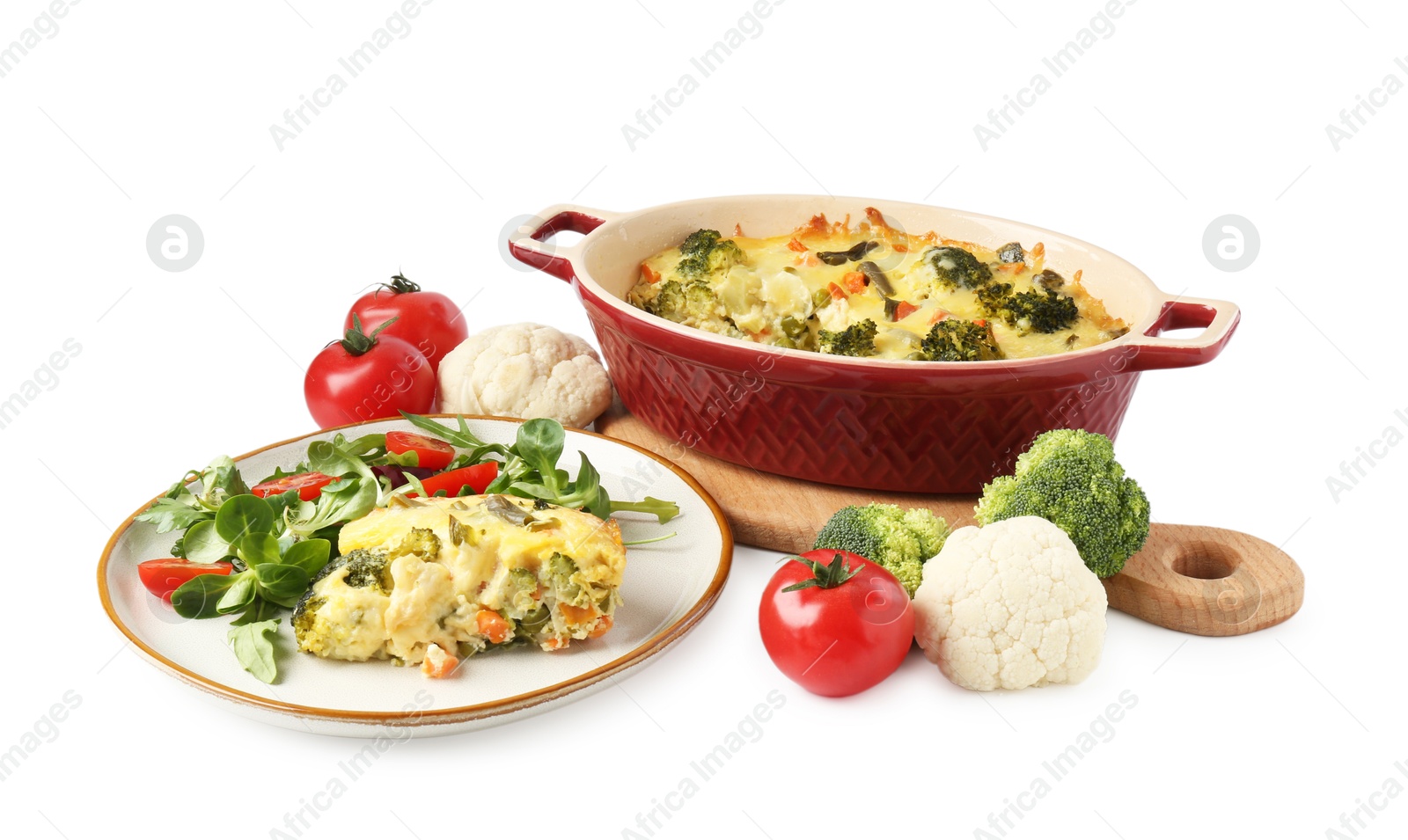 Photo of Tasty vegetable casserole, salad and ingredients isolated on white