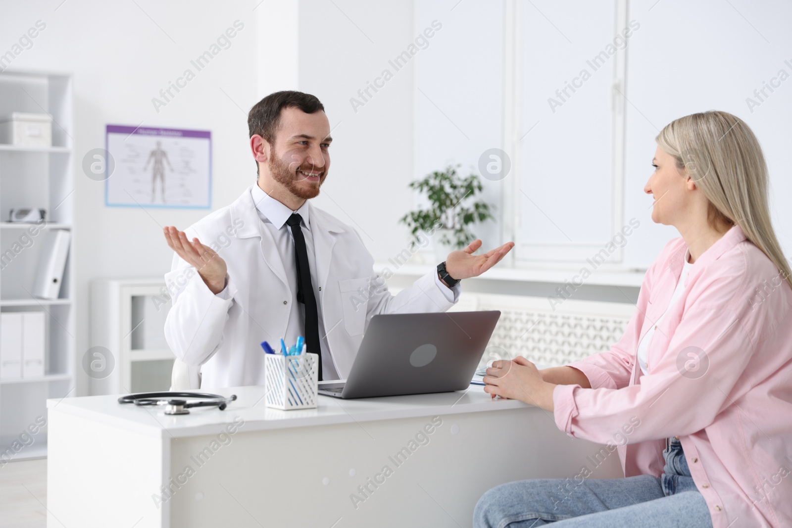 Photo of Woman having appointment with doctor in hospital