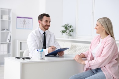 Photo of Woman having appointment with doctor in hospital