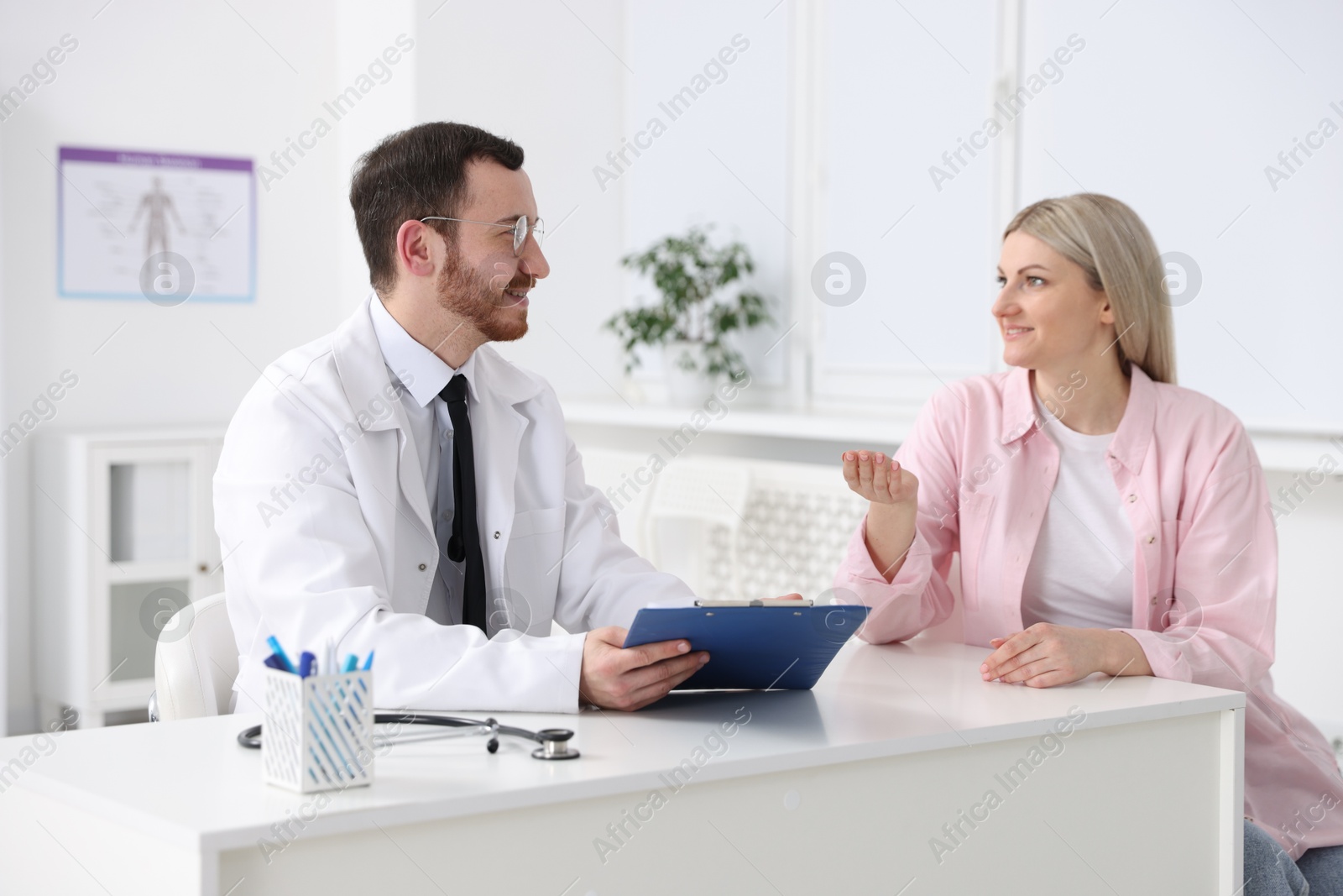 Photo of Woman having appointment with doctor in hospital