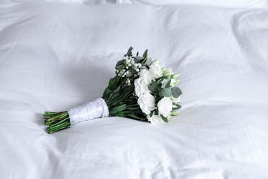 Photo of Wedding bouquet of beautiful flowers on linens