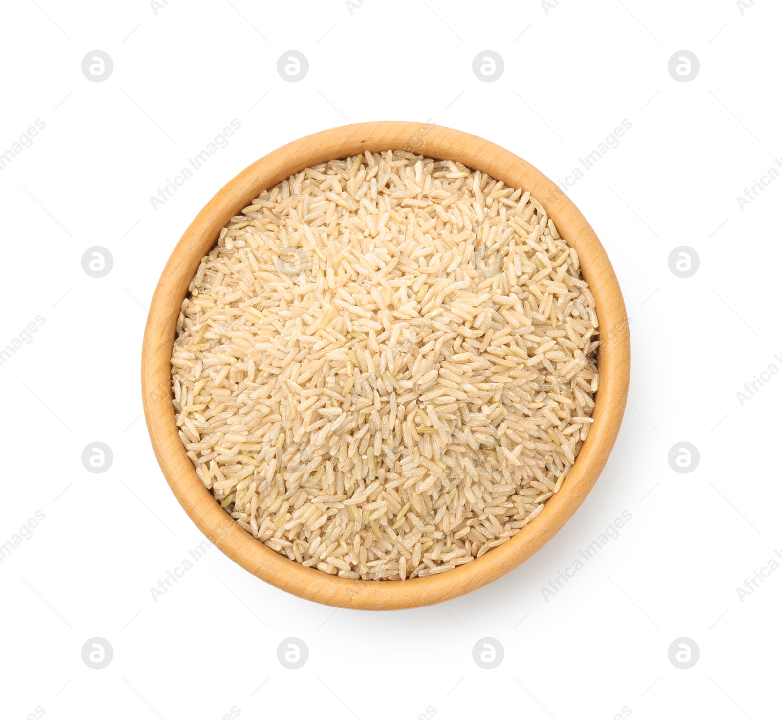 Photo of Raw brown rice in bowl isolated on white, top view