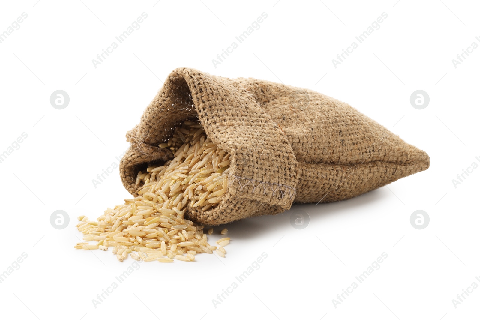 Photo of Raw brown rice in sack isolated on white