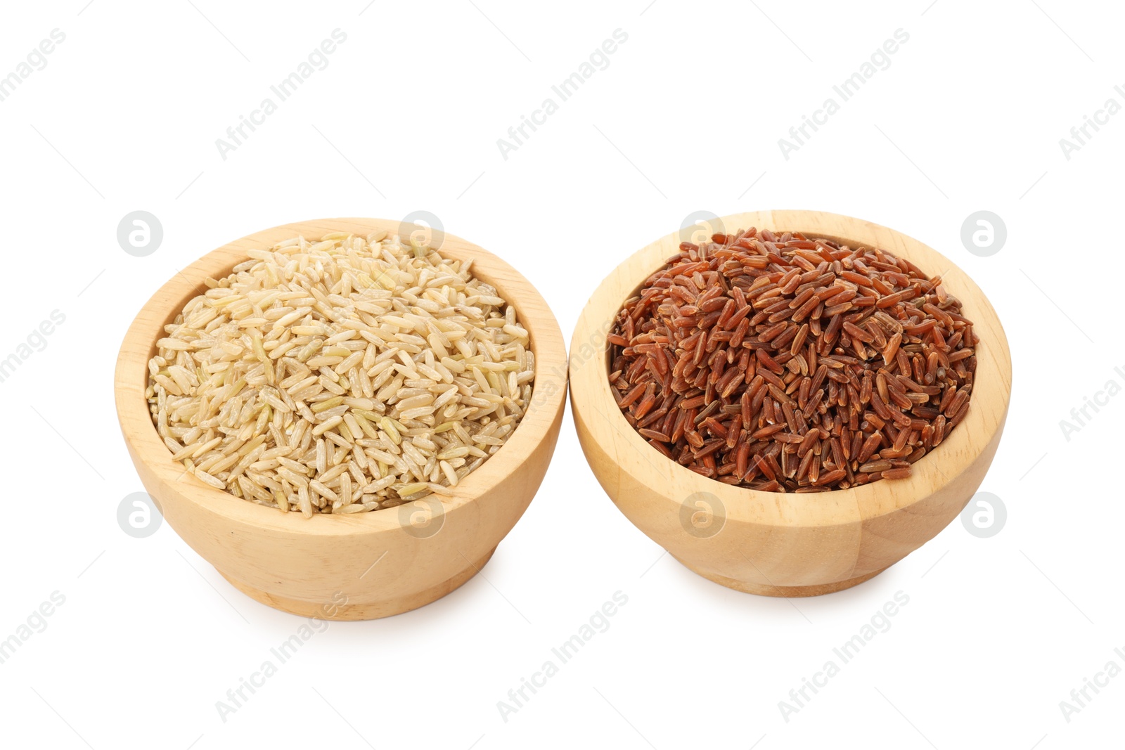 Photo of Different sorts of raw brown rice isolated on white