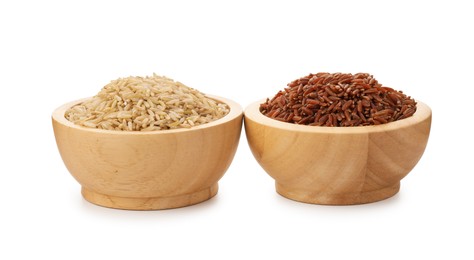 Photo of Different sorts of raw brown rice isolated on white