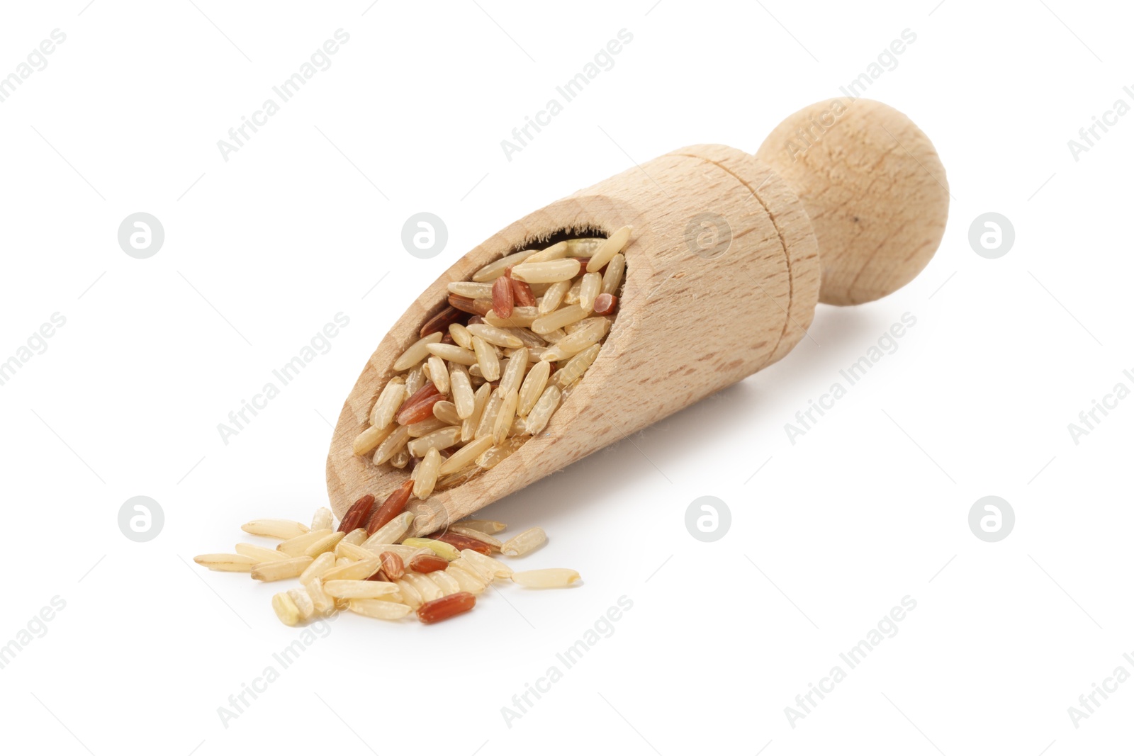 Photo of Different sorts of raw brown rice in scoop isolated on white