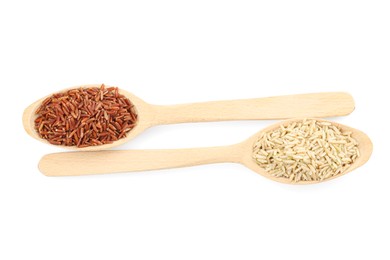 Photo of Different sorts of raw brown rice isolated on white, top view