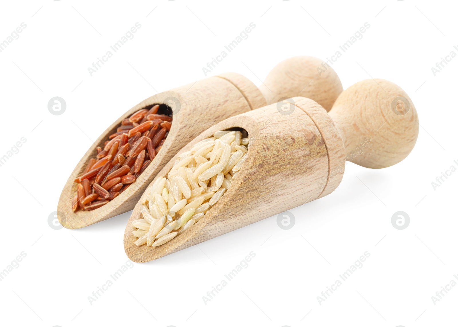 Photo of Different sorts of raw brown rice isolated on white