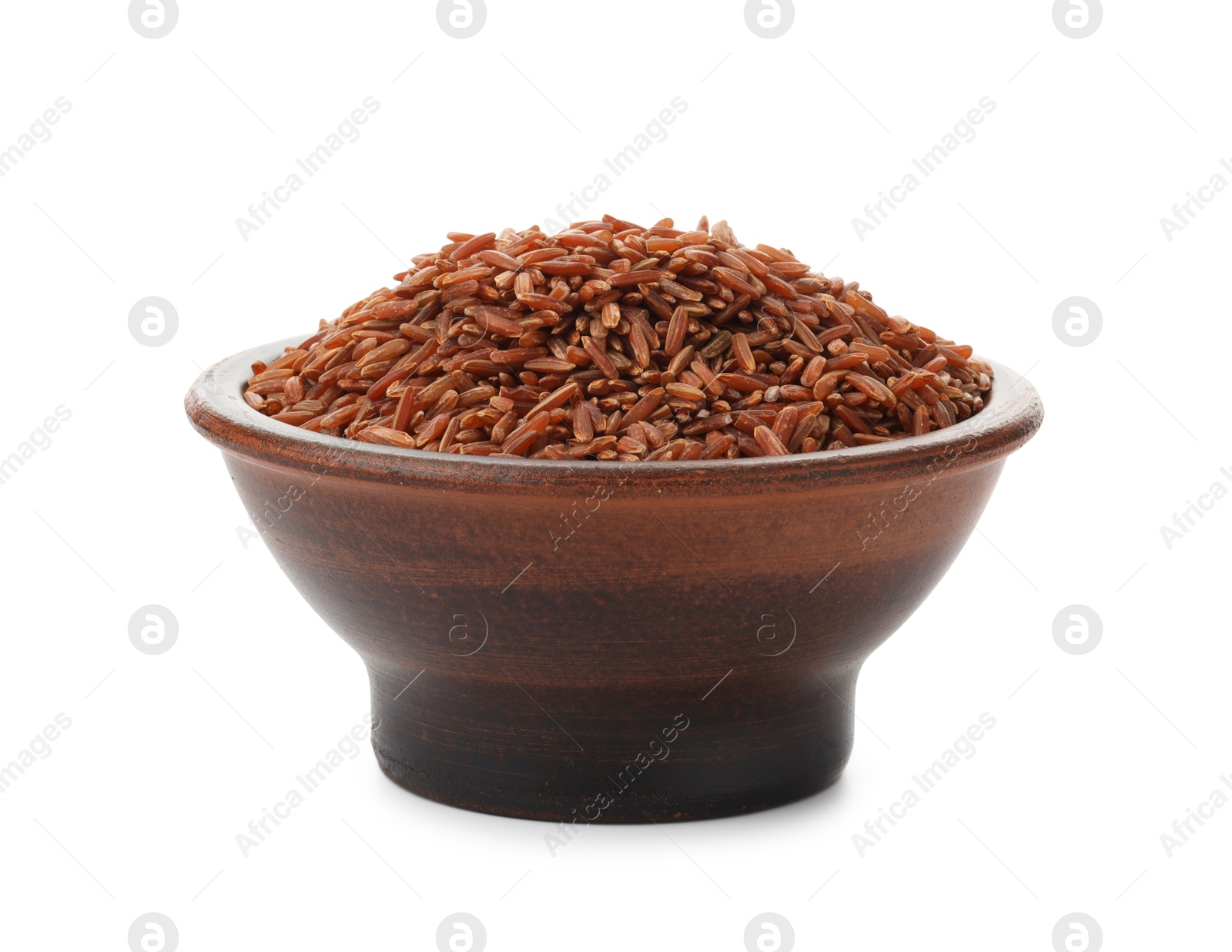 Photo of Raw brown rice in bowl isolated on white