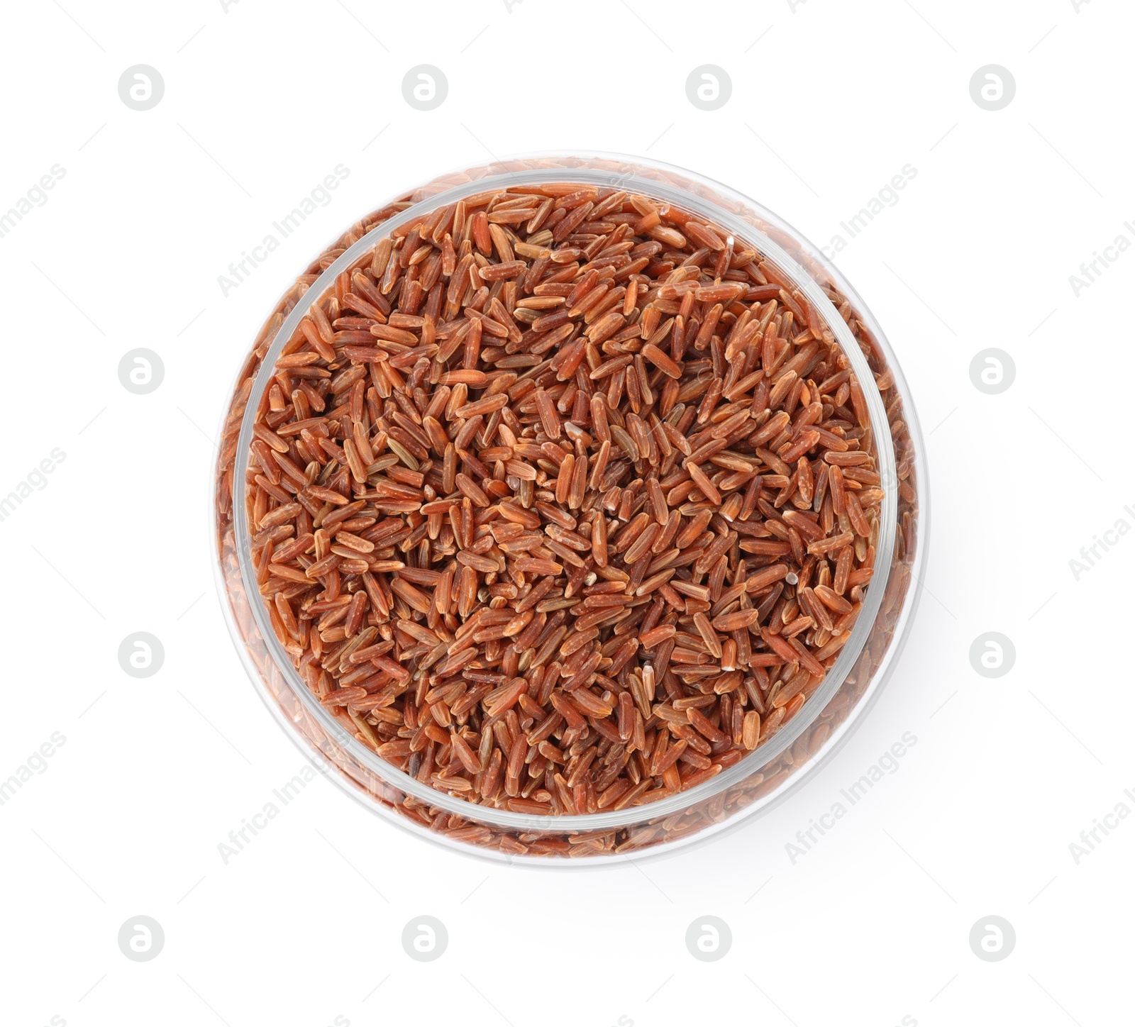 Photo of Raw brown rice in jar isolated on white, top view