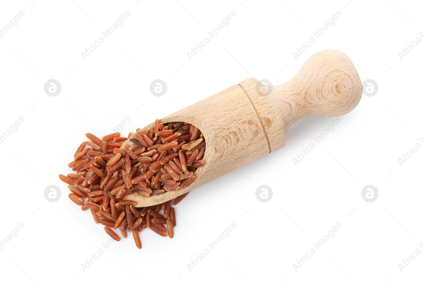 Photo of Raw brown rice in scoop isolated on white, top view